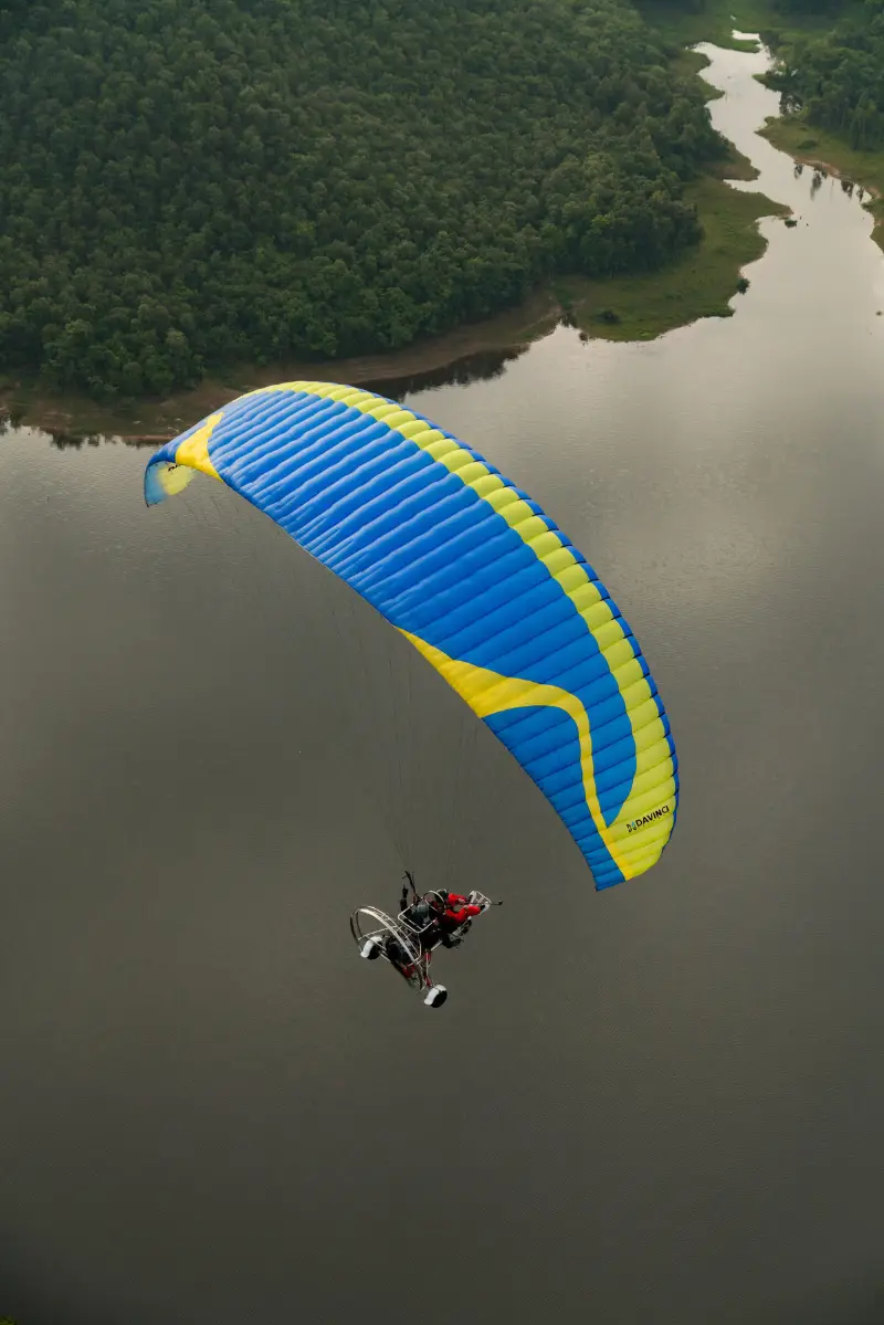 Paramotor wing over a lake near Chiang Mai