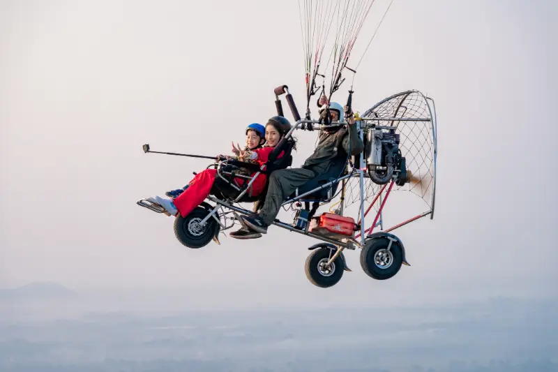 Child ready for a tandem flight with a parent
